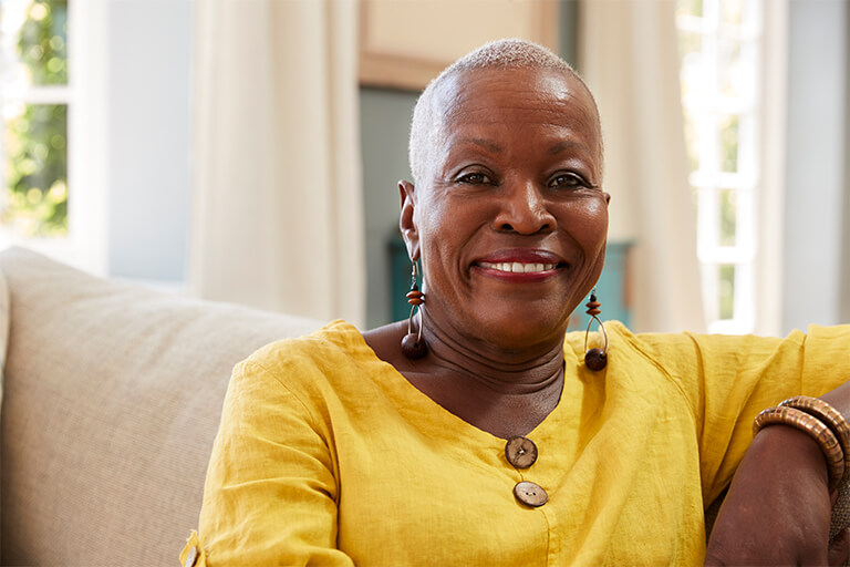 Smiling woman wearing yellow