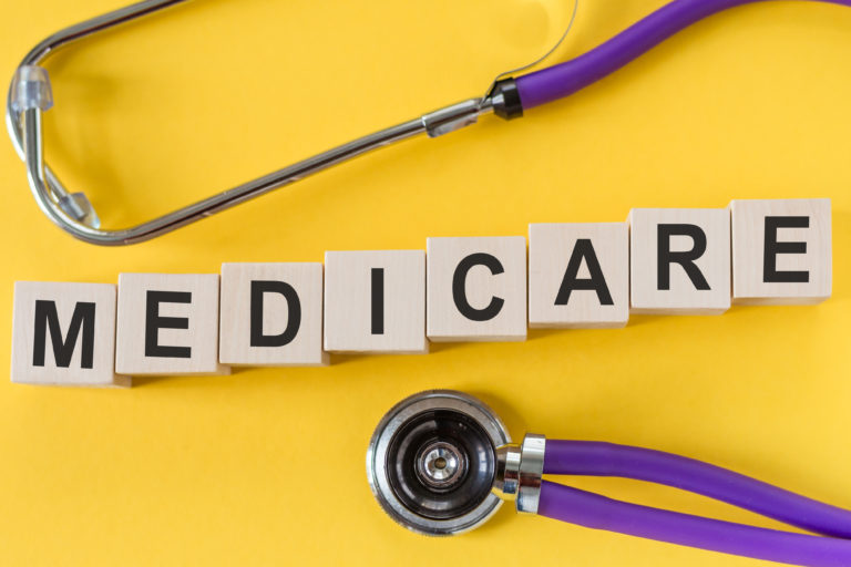 Your Medicare questions answered: Who is eligible, how to apply, and more A stethoscope over the word Medicare
