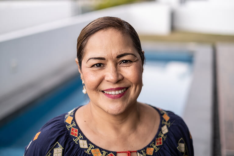 mature hispanic woman smiling