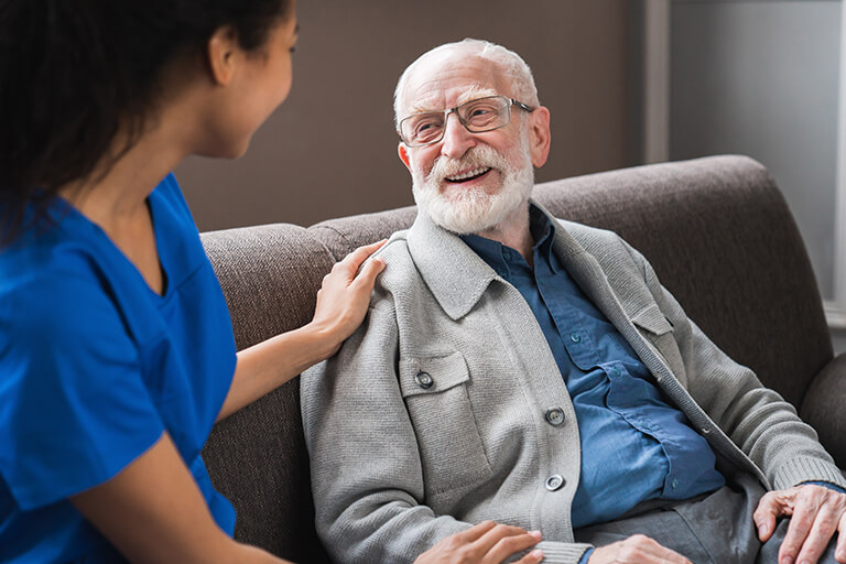 Senior man with care partner