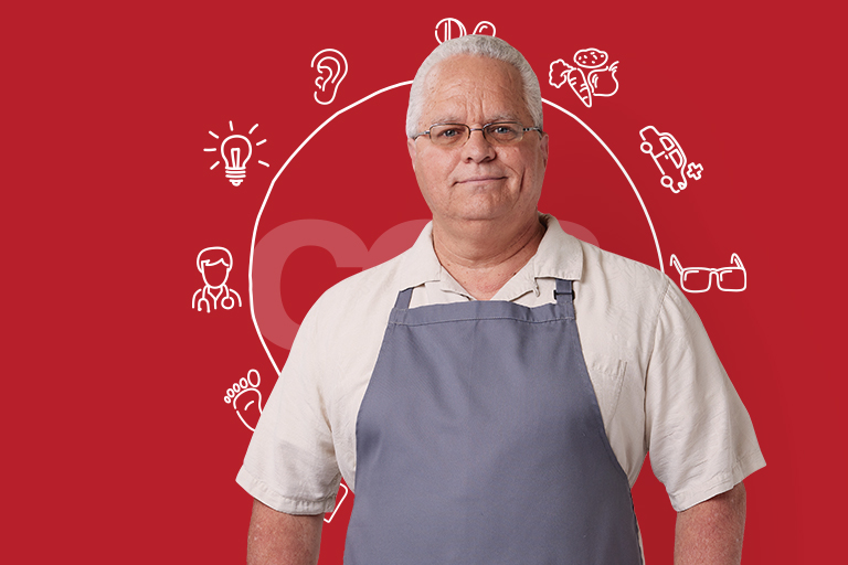 Older man in overalls with CCA Circle of Care in background