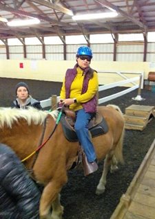Marie loves horseback riding