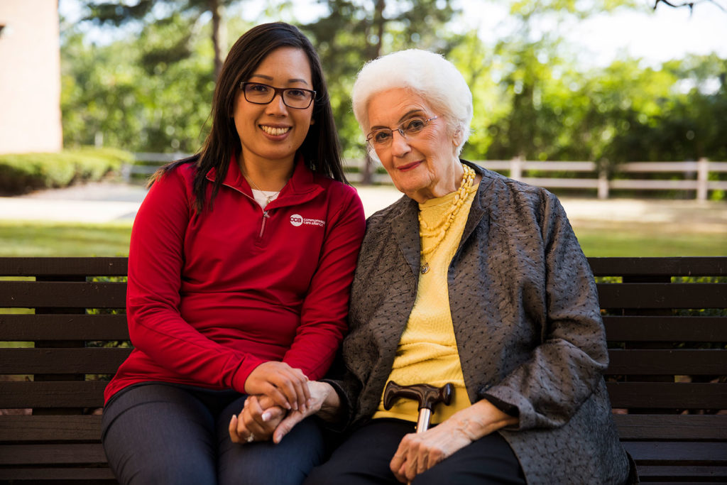 CCA SCO member sitting with her care partner