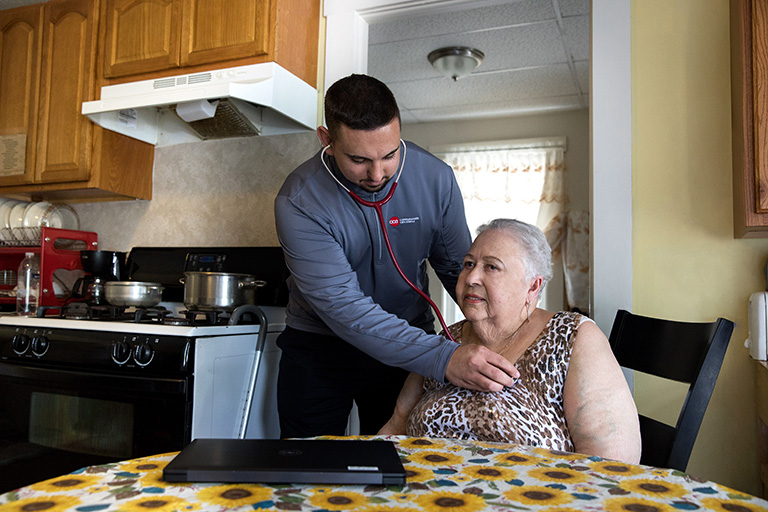 Older woman receiving care from CCA in her home