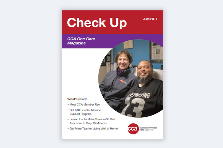 One Care Check Up Magazine: Spring 2021 Male CCA One Care member laying in bed with care partner standing nearby
