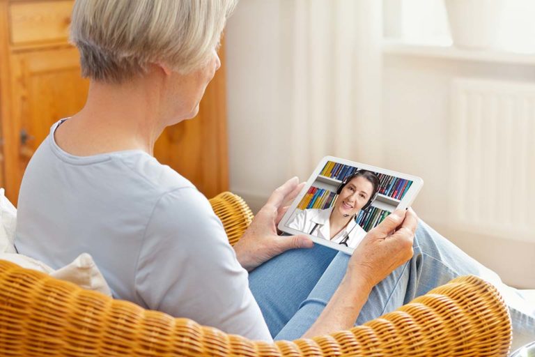 Senior woman having a telemedicine session with her health care provider