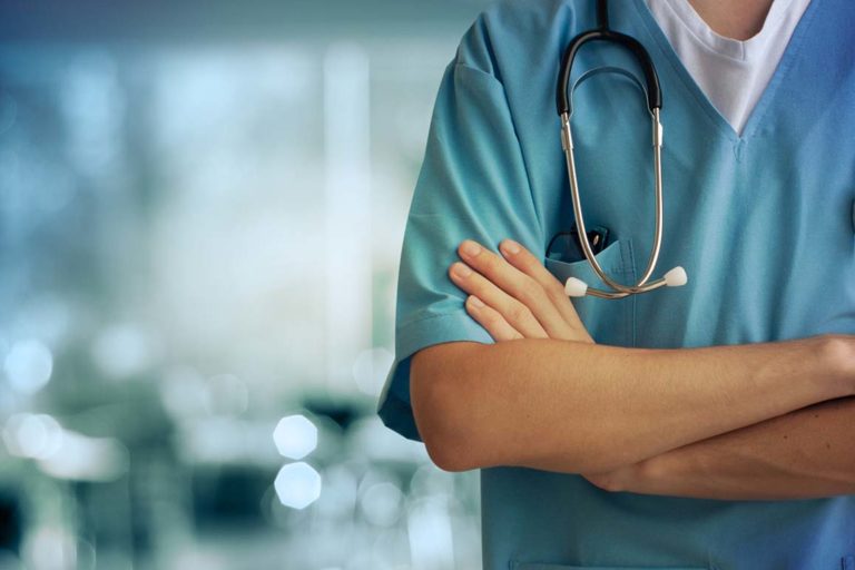 Health care provider standing in a hospital