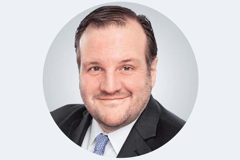 Brian Keane writes op-ed in The Detroit News discussing link between financial instability and poor health outcomes