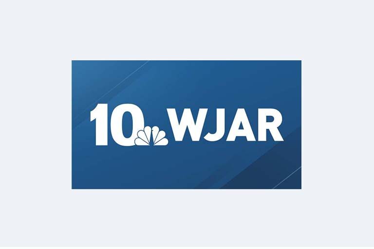 WJAR newsroom logo white text and blue background