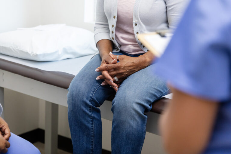 Patient sitting at doctor's office